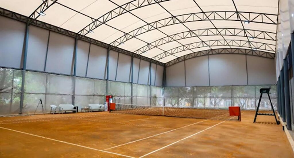 Coperture ad arco per centri sportivi: coperture tennis, padel, palestre e molto altro.